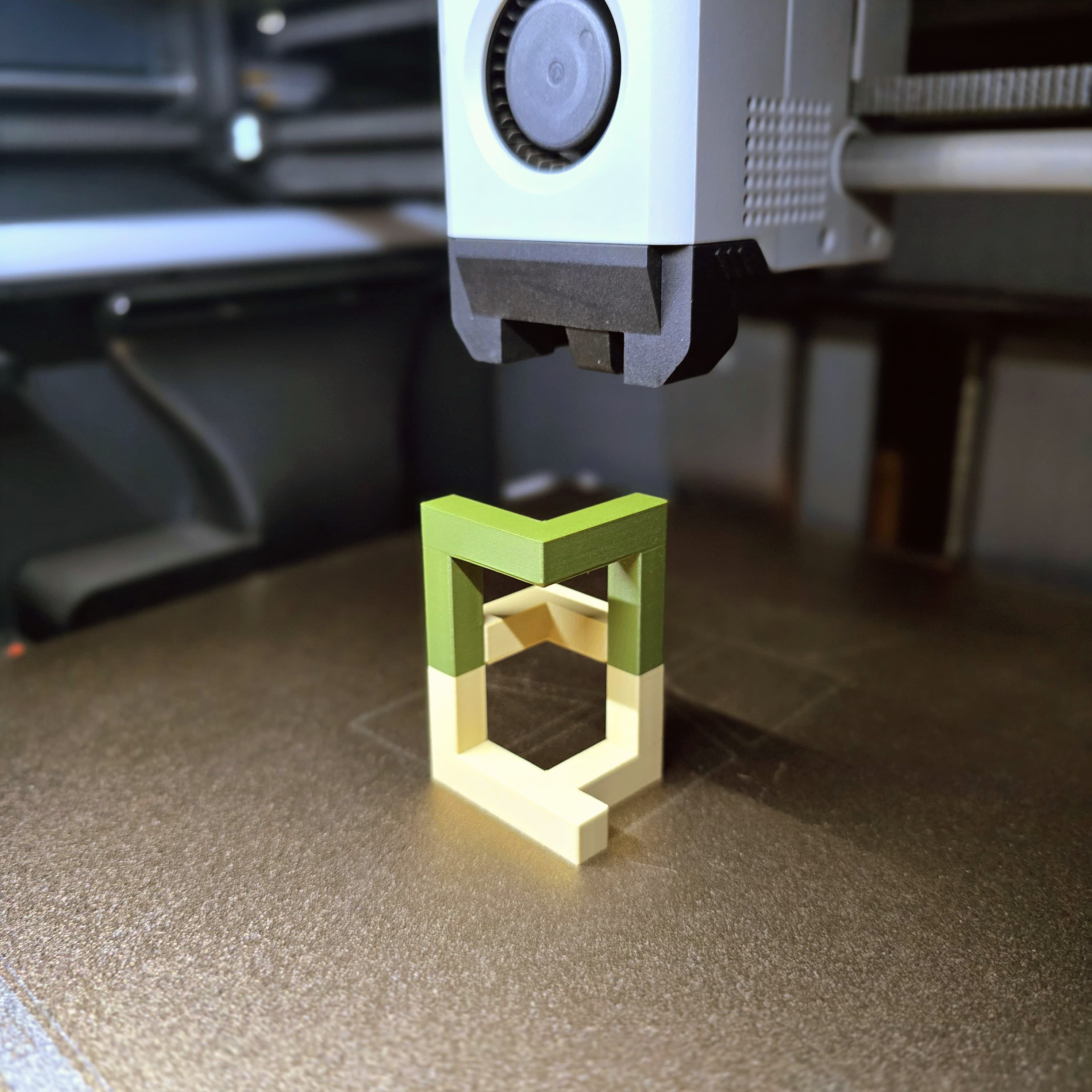 Inside a Bambulab 3D printer at Mantiq Studio - FDM printing in progress